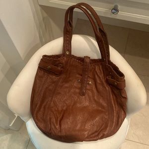 Light brown bag with multiple pockets inside